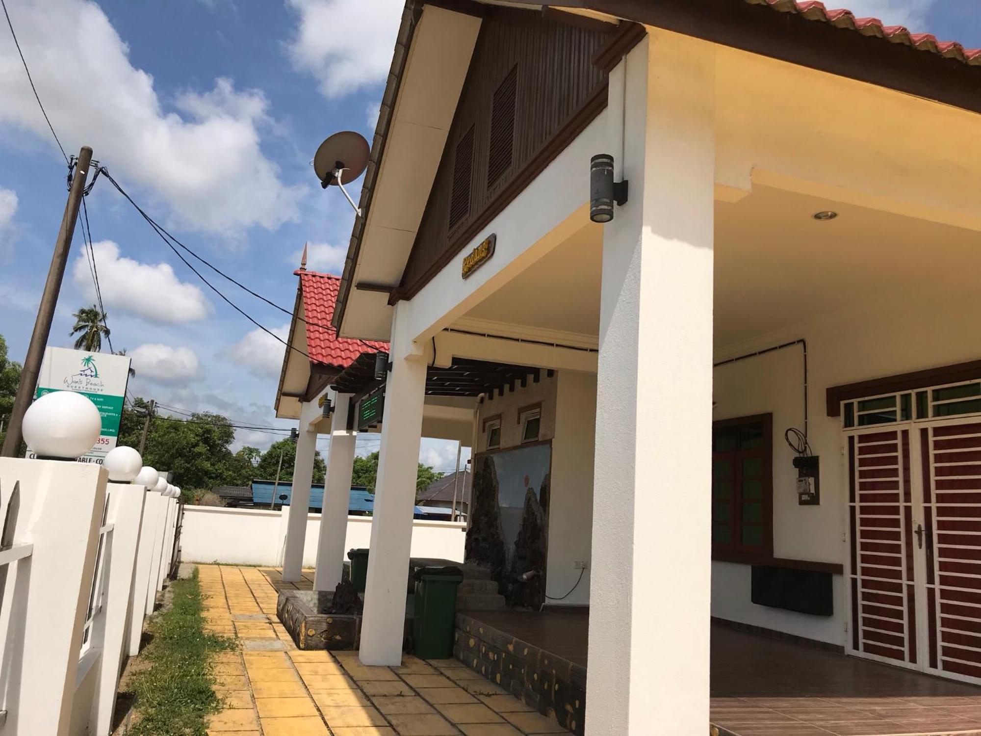 Wan'S Beach Guest House Дунгун Екстериор снимка