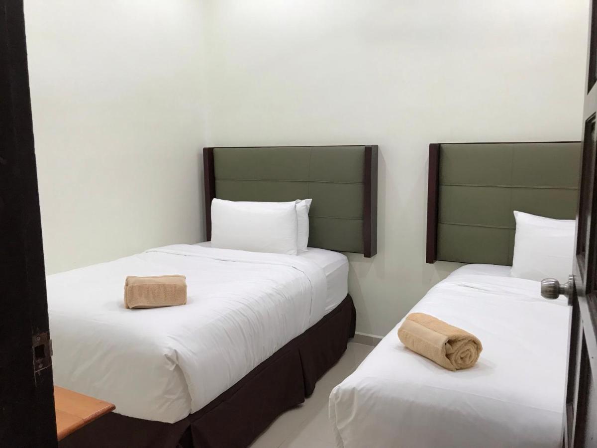 Wan'S Beach Guest House Дунгун Екстериор снимка